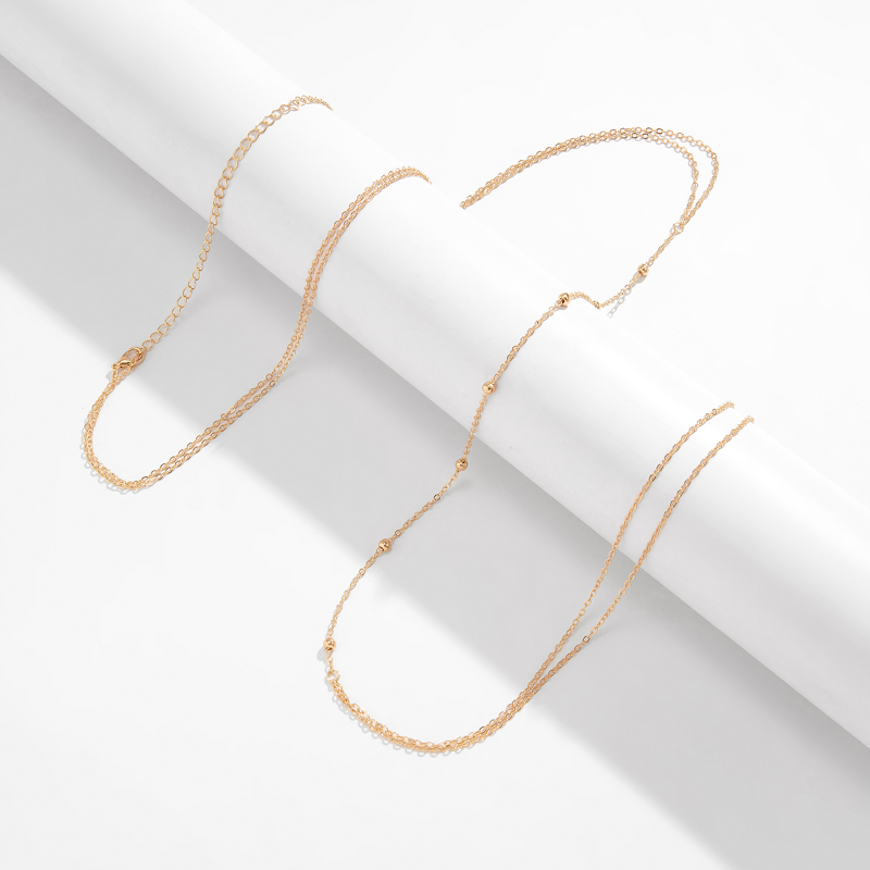 Simple Cross Chest Breast Bell - Body Jewelry Bra recension och pris